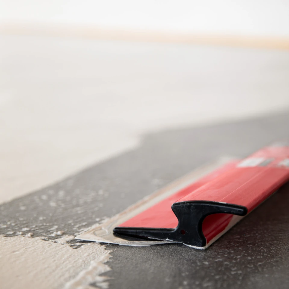 Applying microcement